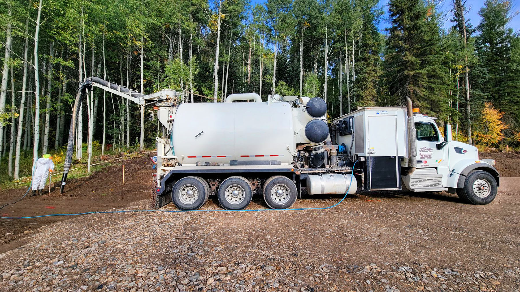 tucker-hydrovac-truck-ouray-county-colorado Tucker Transportation Hydrovac truck performing non-destructive excavation in a forested site in Ouray County, Colorado.